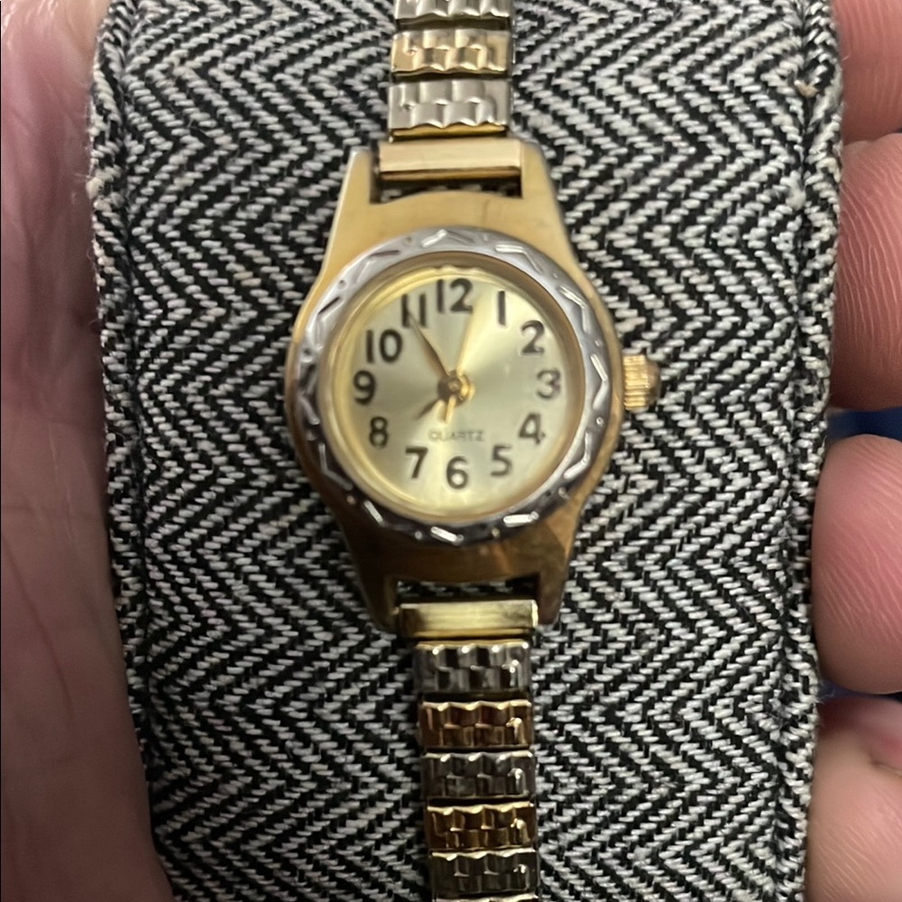 Gold and Silver Watch with Distinctive Band and Easy to Read Face
